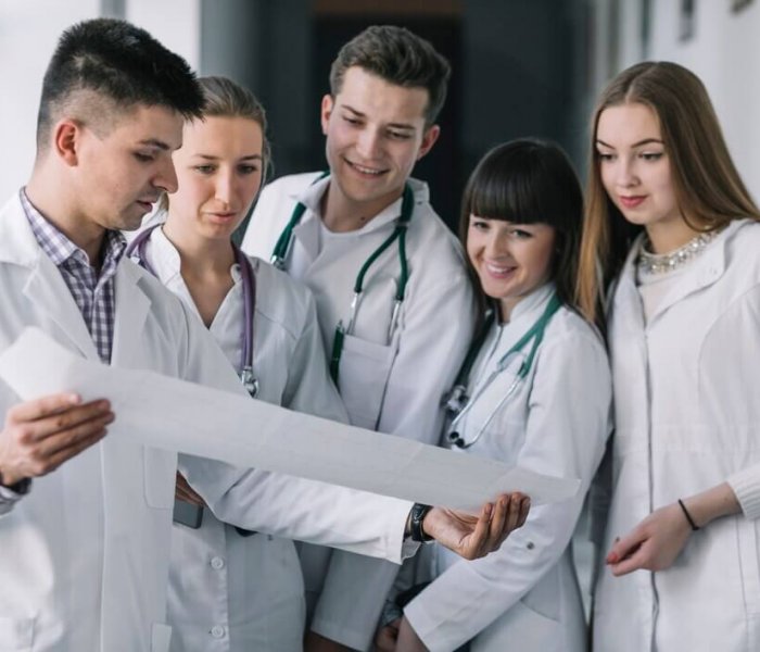 group-doctors-reading-cardiogram_23-2147763823